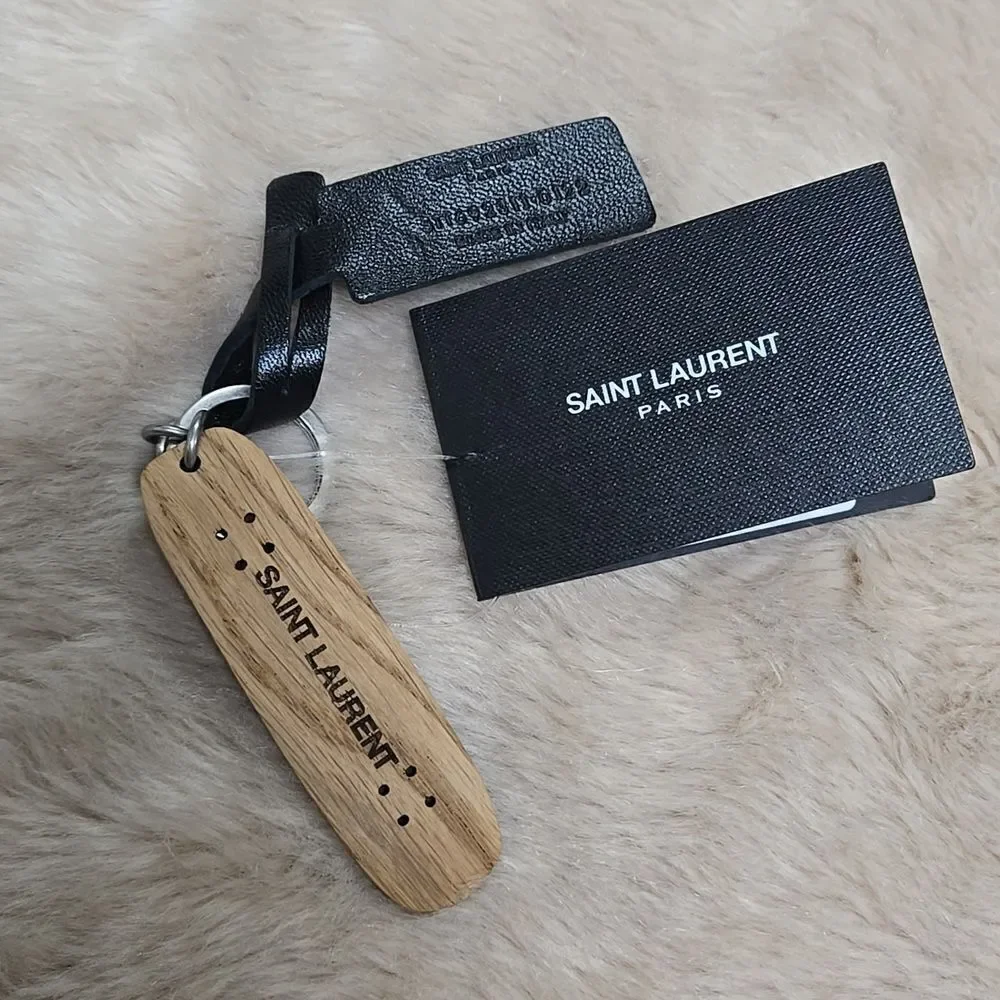 SAINT LAURENT PARIS LOGO SKATE KEYRING - NEW WITH TAGS